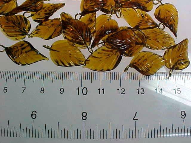 VTG 24 AMBER GLASS CURVY VEINED LEAVES PRESSED BEAD GEM  