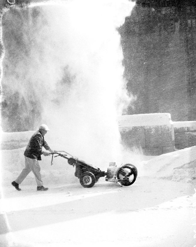 Offering an original 1958 negative of Daily News Snow Plow on Plaza.