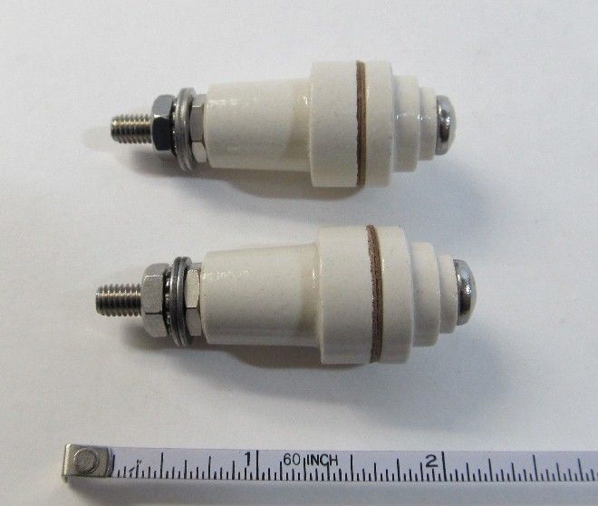 description this listing is for 2 ceramic feedthru insulators they