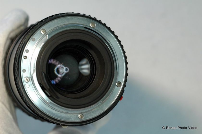   zoom 70 210mm f4 zoom lens s n 5691857 made in japan this lens